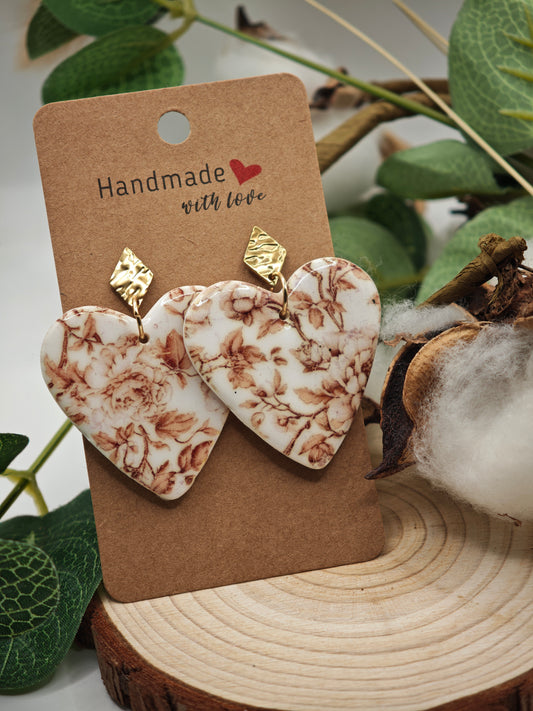 Boucle d'oreille coeur motif floral