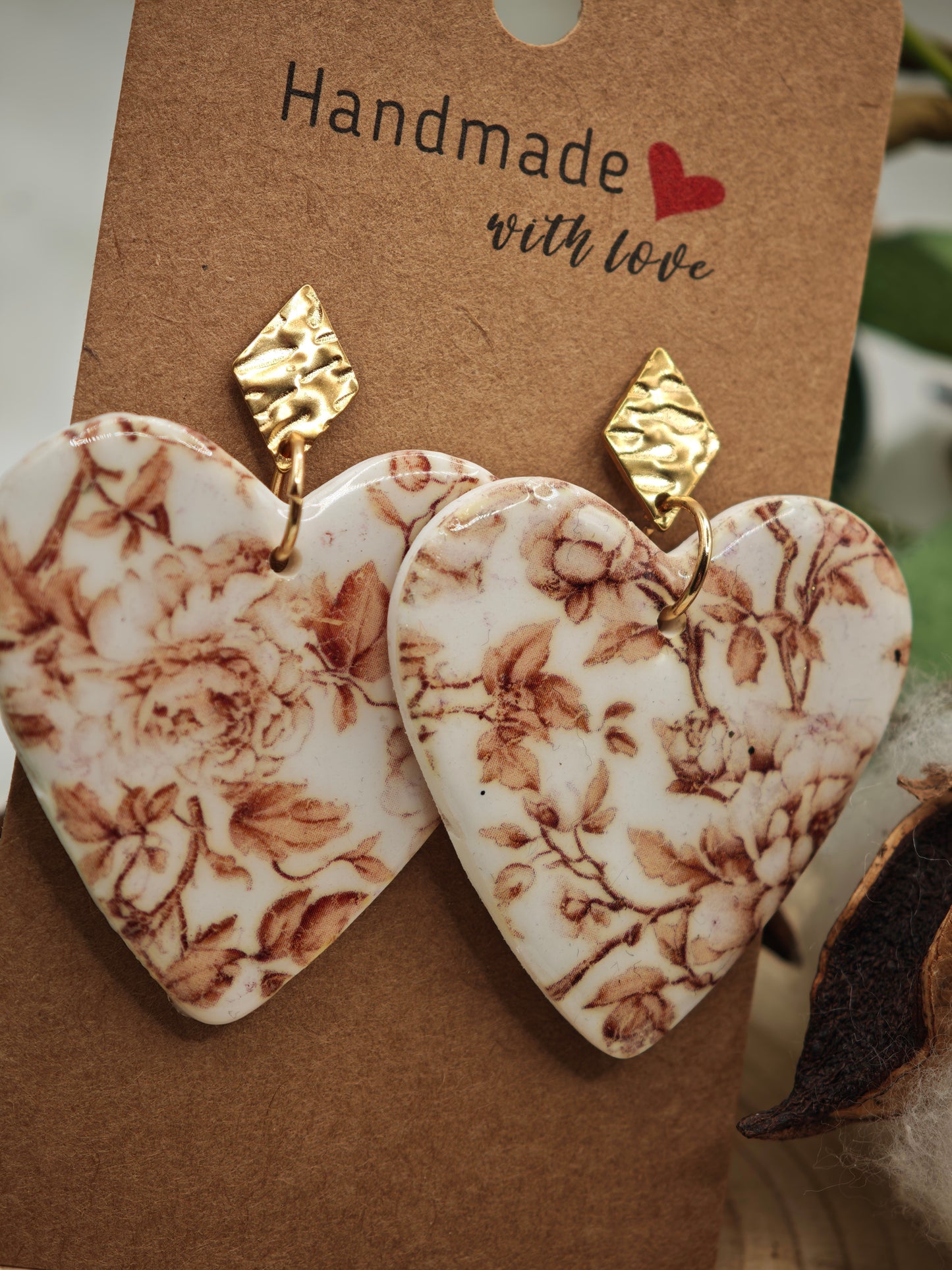 Boucle d'oreille coeur motif floral